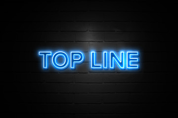 Top Line neon Sign on brickwall