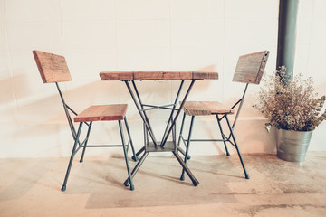 Table and Chair make it wooden and steel ,  furniture modern & loft style  on real wood ,floor and white background Thailand , color vintage style