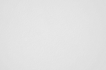 White textured wall background.