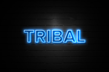 Tribal neon Sign on brickwall