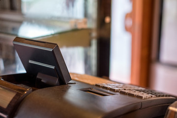Empty cash register on counter