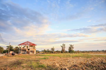 Fototapeta premium construction residential new house in progress at building site
