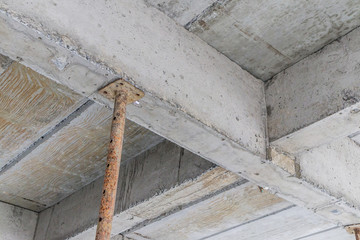 building under construction with iron steel support concrete beams