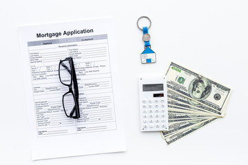 Mortgage application on white background top view copy space