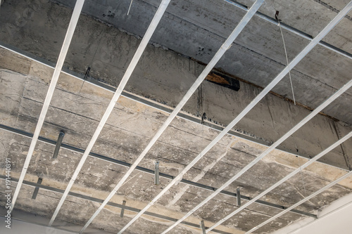 Install Metal Frame For Plaster Board Ceiling At House Under