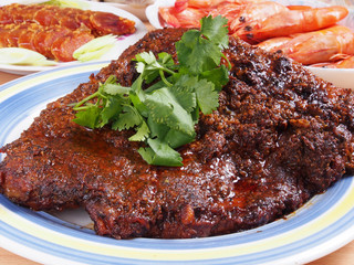 Barbecue pork ribs on wooden table