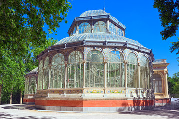 Fototapeta na wymiar Crystal Palace (Palacio de Cristal) in Buen Park del Retiro (Par