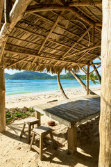 local straw hut on the seychelles beach , Anse marie louise, Mahe, Seychelles Island