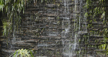 Waterfall on stone wall
