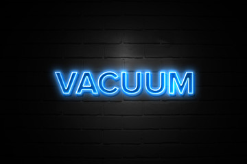 Vacuum neon Sign on brickwall