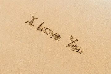 Word of I Love You on Sand