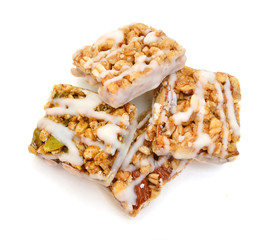 Honey bars with peanuts on white background