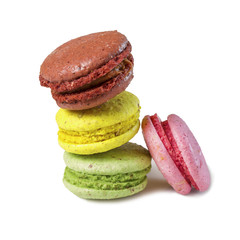 high heap of small round colored French pasta cookies