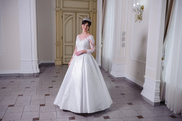 Fototapeta premium Beautiful bride in wedding dress