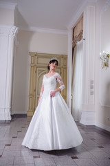 Fototapeta premium Beautiful bride in wedding dress
