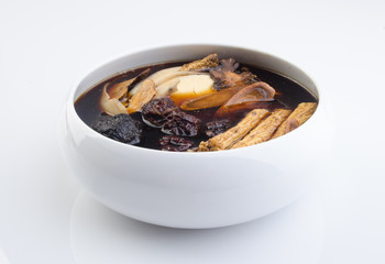 Chinese traditional herbs or medicine. the chinese words is not a logo or trademark.