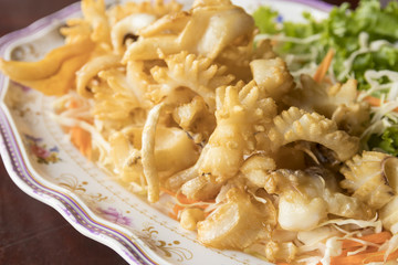 close up of deep fried squid - thai style