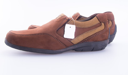 shoe or men's shoes with price tag on a background.