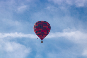hot air balloon in winter sailing across the Alps beautiful views of mistuge snowy mountains and villages on the ground