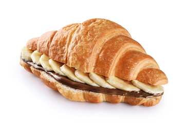 Croissant with chocolate butter and banana isolated on white background.