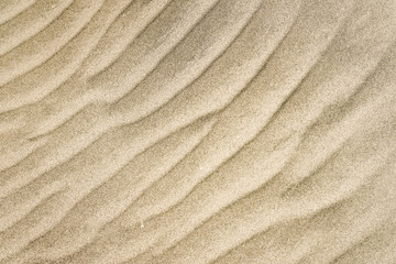 Fototapeta na wymiar Sand pattern, interesting abstract texture from sand tune on cape verde