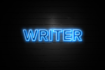 Writer neon Sign on brickwall