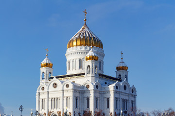 Fototapeta na wymiar Cathedral of Christ the Saviour with golden domes in sunny winter day. Moscow in winter