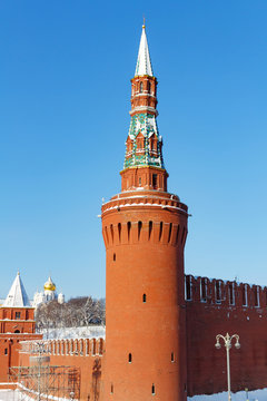 Beklemishevskaya (Moskvoretskaya) tower of the Moscow Kremlin against the blue sky. Moscow winter