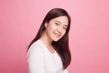 Fototapeta premium Beautiful young Asian woman on pink background