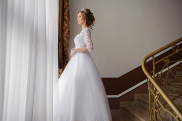 Fototapeta premium Beautiful bride in wedding dress