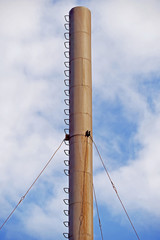Obraz premium Industrial pipes against sky
