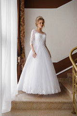 Fototapeta premium Beautiful bride in wedding dress