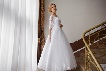 Fototapeta premium Beautiful bride in wedding dress