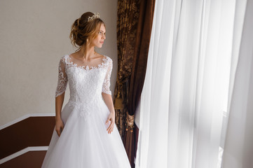 Fototapeta premium Beautiful bride in wedding dress