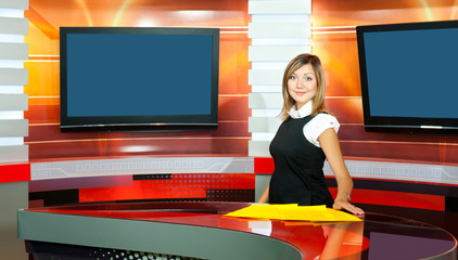 pregnant television anchorwoman at TV studio