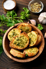Obraz na płótnie Canvas Toasts with cheese, greens and garlic