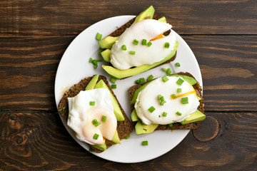 Poached eggs and avocado on bread