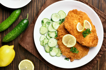 Schnitzel with cucumber salad