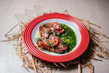 veal in a sauce with vegetables