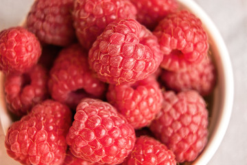 Vitamins. Summer berries. Raspberries background. Close up, top view, high resolution product. Harvest Concept