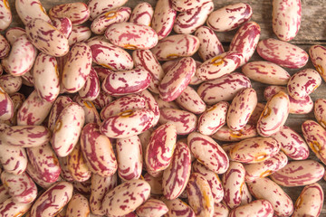 Сolorful pockmarked kidney beans as a background, texture