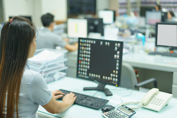 Fototapeta na wymiar Asian woman working on computer at office.