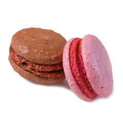 two small round colored French pasta cookies