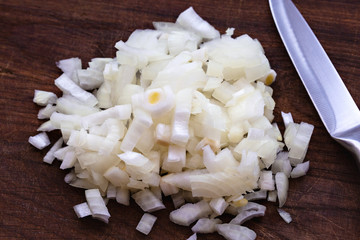 Chopped onion on a wooden board