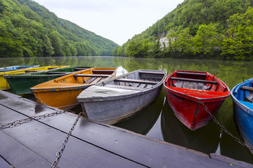 Fototapeta na wymiar colorful boats on the lakeshore
