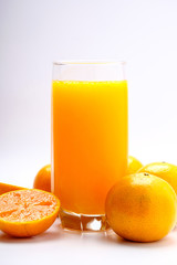 Fresh orange juice on white background