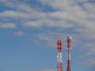 Telecommunication Towers  Poles  and Antenna against blue sky