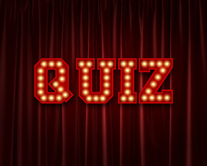 Quiz lightbulb lettering word against a red theatre curtain. 3D Rendering