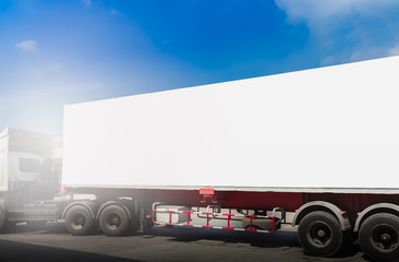 Fototapeta na wymiar Truck transportation with white container and blue sky background.