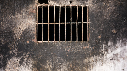 Iron window, dirty black color wall
